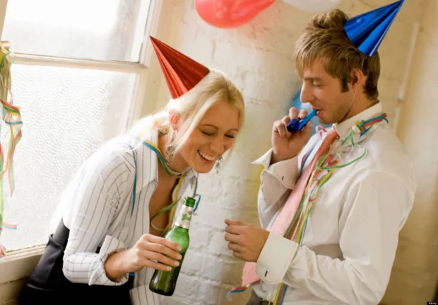couple flirting at an office party