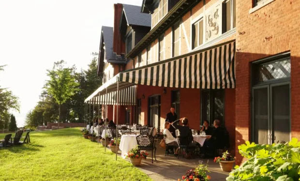 Dine inside or outside, overlooking the lake and gardens