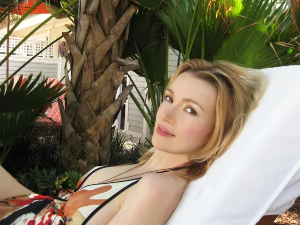 The Breakers is Perfection in Palm Beach Lounging by the pool in a Breakers Cabana