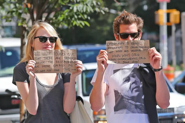 How Do Celebrities Really Affect Us? Couple Emma Stone and Andrew Garfield using their celebrity status to draw attention to a good cause after leaving lunch in New York City.