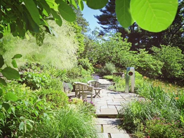 6 Reasons to Visit Buttermilk Falls One of many seating areas sprinkled around the grounds at Buttermilk Falls Inn