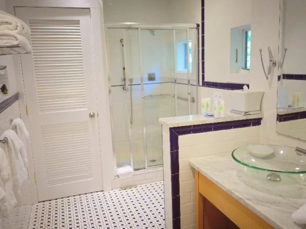 6 Reasons to Visit Buttermilk Falls The large bathroom in the North Cottage even has a window in the shower