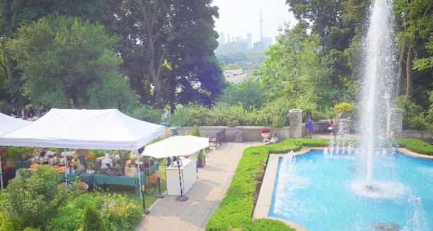 Having a feast at Casa Loma, with the Toronto skyline in the background