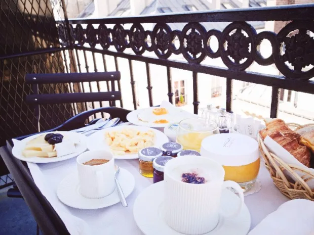 Doing the 8th in Paris Like a (Glam) Parisian Enjoying the complimentary breakfast on the Diderot suite's balcony