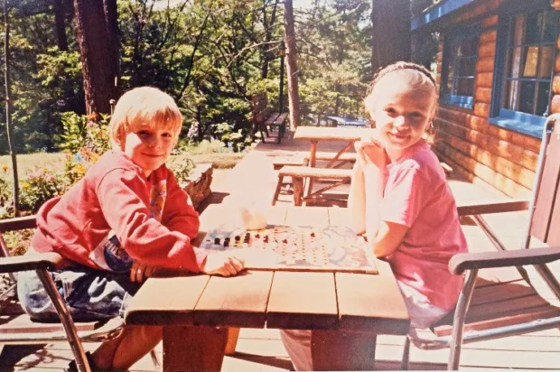 My brother and I playing a game at the cottage
