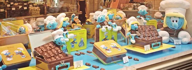 A Foodie's Tour of Belgium A Smurfs and chocolate window display in a Neuhaus store in The Galeries