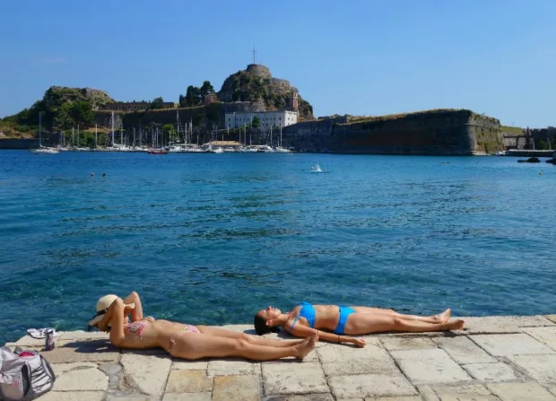 Women tanning in Corfu